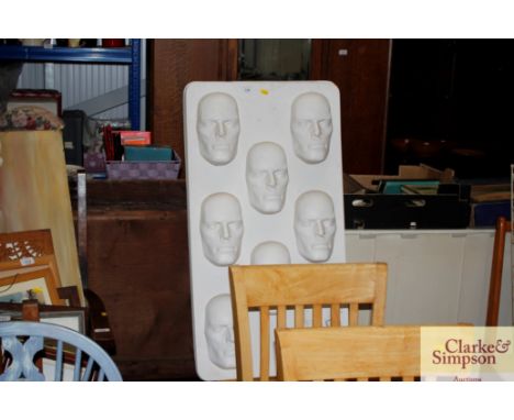 A quantity of male mannequin face moulds