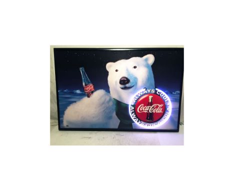 Coca-Cola poster featuring the Coca-Cola polar bear. Pink neon light around the Coca-Cola logo. 1994. Size: 64 x 92 cm. Condi