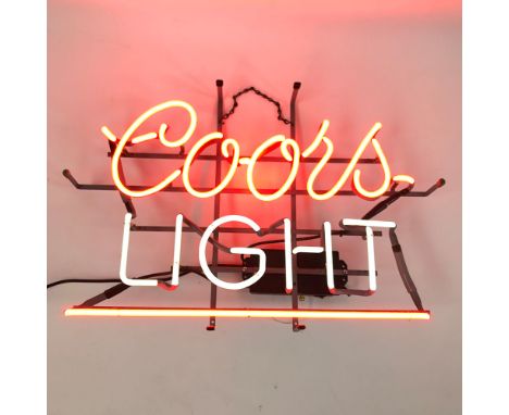 Original Coors Light neon sign from around 1980's. Very good working condition with two color neon lights. Size: 50 x 70 x 10