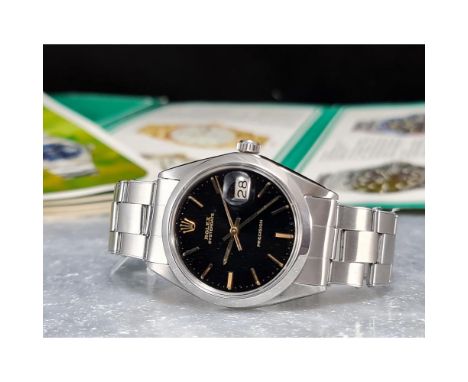 A very nice stainless steel vintage hand-wound Rolex Oysterdate Precision 6694 from 1969, fitted with a black dial with gold 