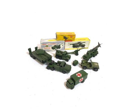 A set of 9 Dinky army toys. Number 692 - 661 - 665 - 626 - 651 - 660 + tractor - US Jeep + trailer,  3 original boxes, 2 piec