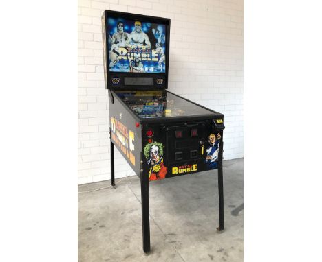 Very nice Data East WWF Royal Rumble Pinball Machine from 1994. This is a wide body cabinet with dot matrix display. The play