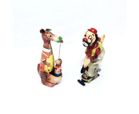 A Set of 2 TPS Tin Toys. One TPS clown on roller skates in very good condition and one TPS mama kangaroo with playful baby in