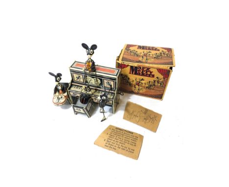 A Complete set of tin toys Marx Merry Makers. Comes with original box with loose flaps and seams that have come loose. Size: 