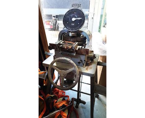 Unrestored, fully functional Graphotype machine used for making World War II army dog tags. Condition: Fair.