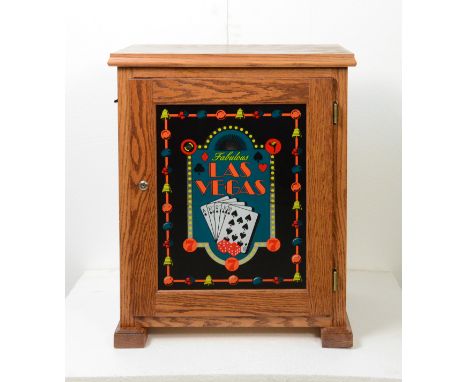 Wood slot machine stand with decorative front mirror door that has Fabulous Las Vegas printed on it. Locked, without key. Has