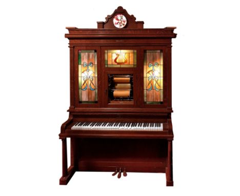 This Wurlitzer Style C Orchestrion has a high-grade piano with mandolin attachment, two ranks of pipes – Violin and Flute, or