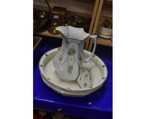 A Royal Corona ware three piece wash basin, jug and vase