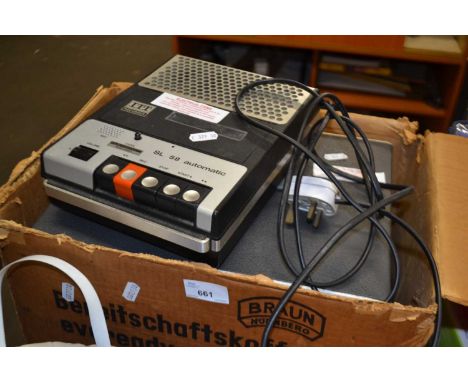 Vintage projector together with a vintage cassette recorder