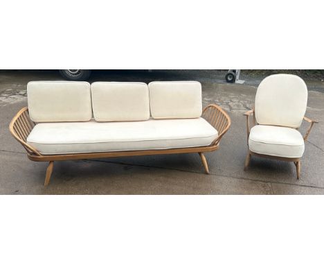 Ercol sofa and chair with cushions, approximate measurements: 82 inches width x 32 inches depth x 29 height 
