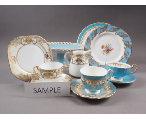 A Noritake part teaset, a similar gilt decorated part teaset, Aynsley turquoise and gilt decorated tea cups and saucers, and 