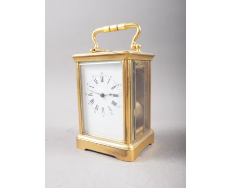 A brass cased carriage clock, 5 1/2" high 
