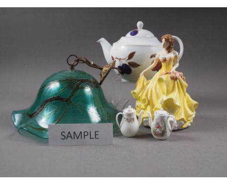 A Royal Worcester "Evesham" pattern teapot, in box, a Royal Doulton Pretty Ladies, "Summer" figure, 8 1/2" high, another figu