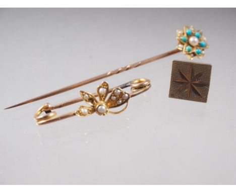 A yellow metal, turquoise and seed pearl stick pin, a 9ct gold and seed pearl butterfly brooch (damages) and a 9ct gold pin, 