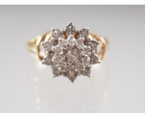 An 18ct gold and diamond cluster ring, size M, 4.9g 