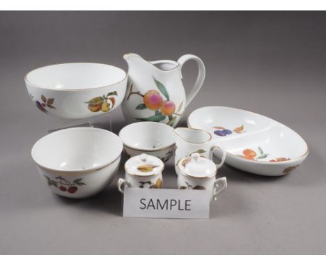A quantity of Royal Worcester "Evesham" pattern tableware, including two tureens, flan and quiche dishes, hot chocolate pots,