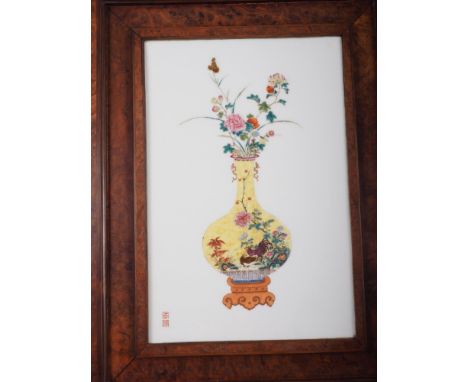 A Chinese porcelain plaque with vase and flower decoration, seal marks, 9 3/4" wide x 14 1/2" high, in hardwood frame, on sta