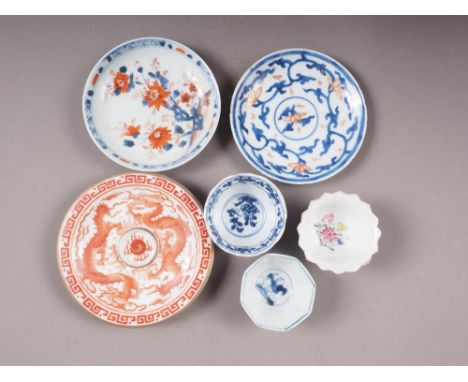 Two Chinese Imari saucers, a Chinese saucer, decorated dragons, two Chinese blue and white porcelain tea bowls, and a Chinese