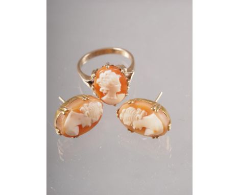 A 9ct gold and carved shell cameo dress ring, size L, 3.1g, and a similar pair of ear studs, 3.6g 