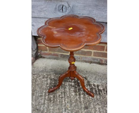 A yew octofoil wine table, on turned column and carved tripod splay support, 16" dia x 21 1/2" high 