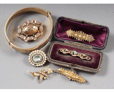 A Victorian 15ct gold brooch, another similar yellow metal brooch set, seed pearls formed as a bird and flowers, stamped 15ct
