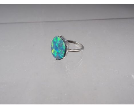 A white gold, platinum and opal doublet dress ring, size L/M, 2.2gCondition: No visible problems 