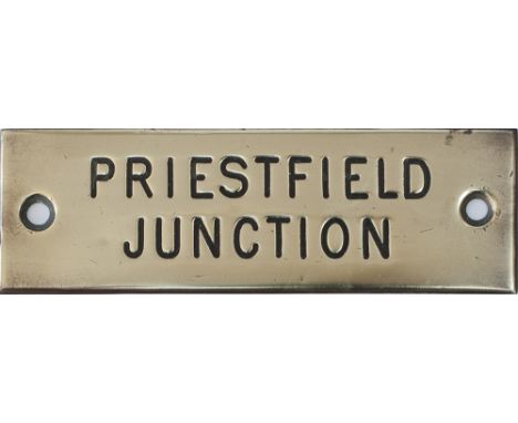 GWR brass shelf plate PRIESTFIELD JUNCTION, machine engraved and complete with original black wax infill. Measures 4.75in x 1