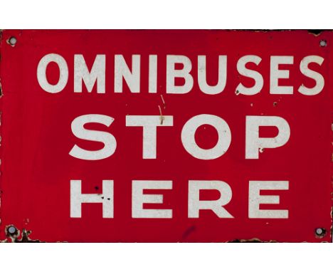 Motoring bus enamel sign double sided OMNIBUSES STOP HERE, white on red enamel measuring 15.5in x 10in. In good condition.