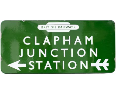 BR(S) FF enamel station direction sign CLAPHAM JUNCTION STATION with British Railways totem at the top and left facing arrow.