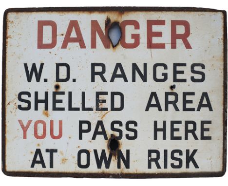 Enamel sign DANGER W.D.RANGES SHELLED AREA YOU PASS HERE AT OWN RISK. Measures 24in x 18in and is in fair condition with loss