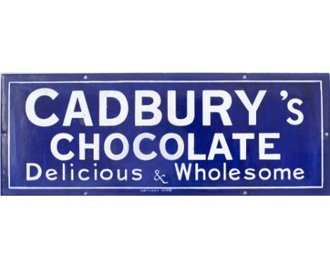 Enamel advertising sign CADBURY'S CHOCOLATES DELICIOUS & WHOLESOME. Measures 17.5in x 6.5in and is in good displayable condit
