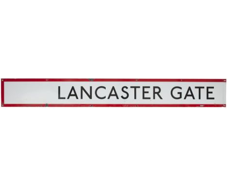 London Transport enamel frieze sign LANCASTER GATE. Measures 72in x 9in and is in good condition with some small edge chippin