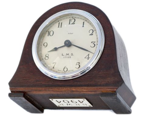 LMS oak cased mantel railway clock. The 3.5in silvered dial is marked ENFIELD LMS 17165, the case also has a BR-WR numberplat