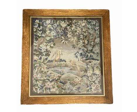 1940's wool tapestry worked with Herons beside a lake and a wooded landscape signed and dated Blanche Day, 1941, within a gil