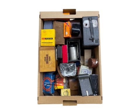 Collection of vintage camera equipment including Kodak Vest Pocket camera, Houghton Mascot box camera, Voigtlander Brilliant 