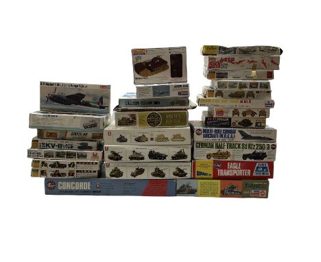 Twenty-eight plastic model kits including Airfix 'Multi-Role Combat Aircraft' 1/72 scale, Airfix 'German Half-Track Sd Kfz 25