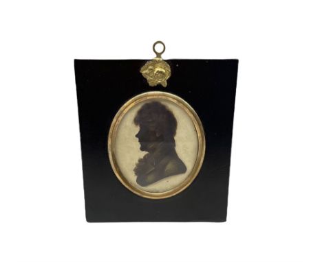 19th century head and shoulders portrait of a gentleman in ebonised frame 8cm x 6cm