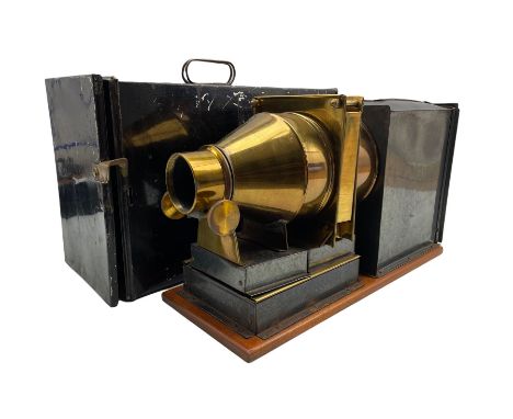 Magic lantern with brass lens in metal case