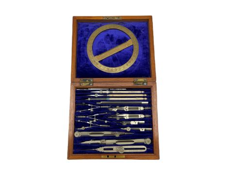 Early 20th century set of drawing instruments including a brass protractor, 19th century ivory parallel rule, Stanley ivory r