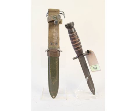 A U.S.A. M4 knife bayonet with a US M8 scabbard and belt loop
