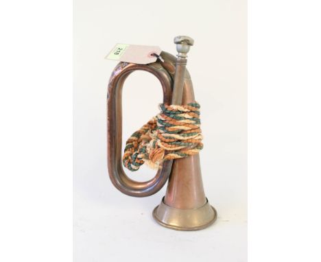 A copper and brass bugle by Boosey and Hawkes Ltd London