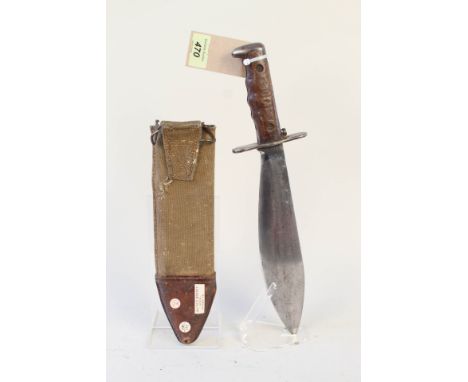 A U.S.A. WWI era model 1910 'Bolo' knife with canvas scabbard, blade marked S.A. 1912/US 21841 with scabbard marked 1911