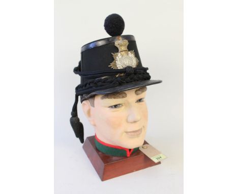 A British Army Shako 1869-1879 with London Rifle Brigade plate, maker Edward Smith 139 Ebury St Eaton Square S.W., a hand mad
