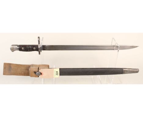 A British model 1913 (by Remington) bayonet with scabbard and webbing frog