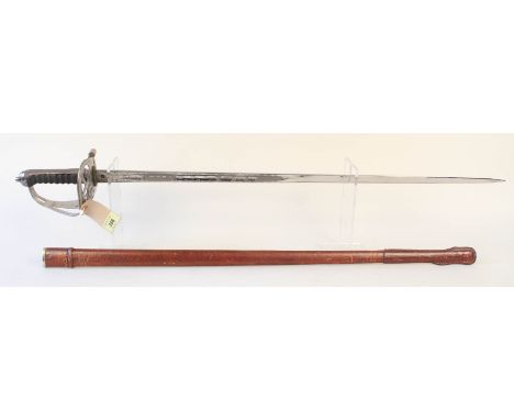 A British 1854 patt Irish Foot Guards officers sword and leather scabbard, blade with GV cypher and N.K. (owners initials)