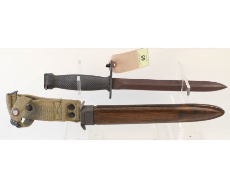 A U.S.A. M.7 bayonet with scabbard/belt hook