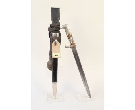 A German Third Reich era Police dress bayonet (working stud and slotted) by Carl Eickhorn with scabbard, leather frog (dated 