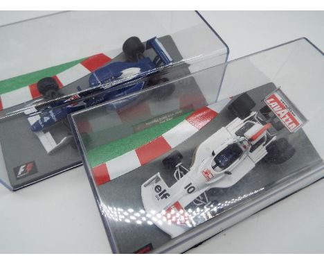 F1 Formula One - two 1:43 scale models comprising Tyrrell Ford # 019 1990 as driven by Jean Alesi, and March # 751, 1975 as d