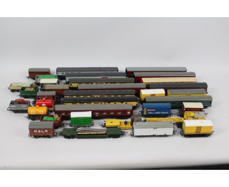 Hornby - Trix - Airfix - Lima - A collection of 33 x items of rolling stock including 12 x coaches,  5 x open wagons, 3 x gua