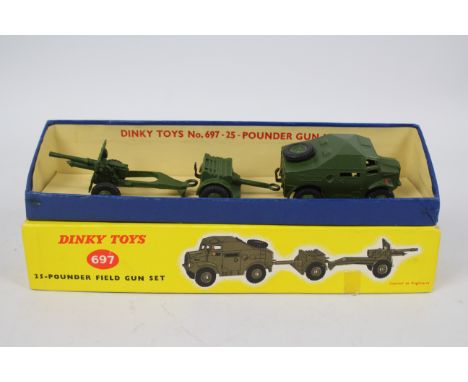 Dinky - Military - A boxed Dinky 25-Pounder Field Gun Set with Field Tractor, Trailer and field Gun. The models appear Near M